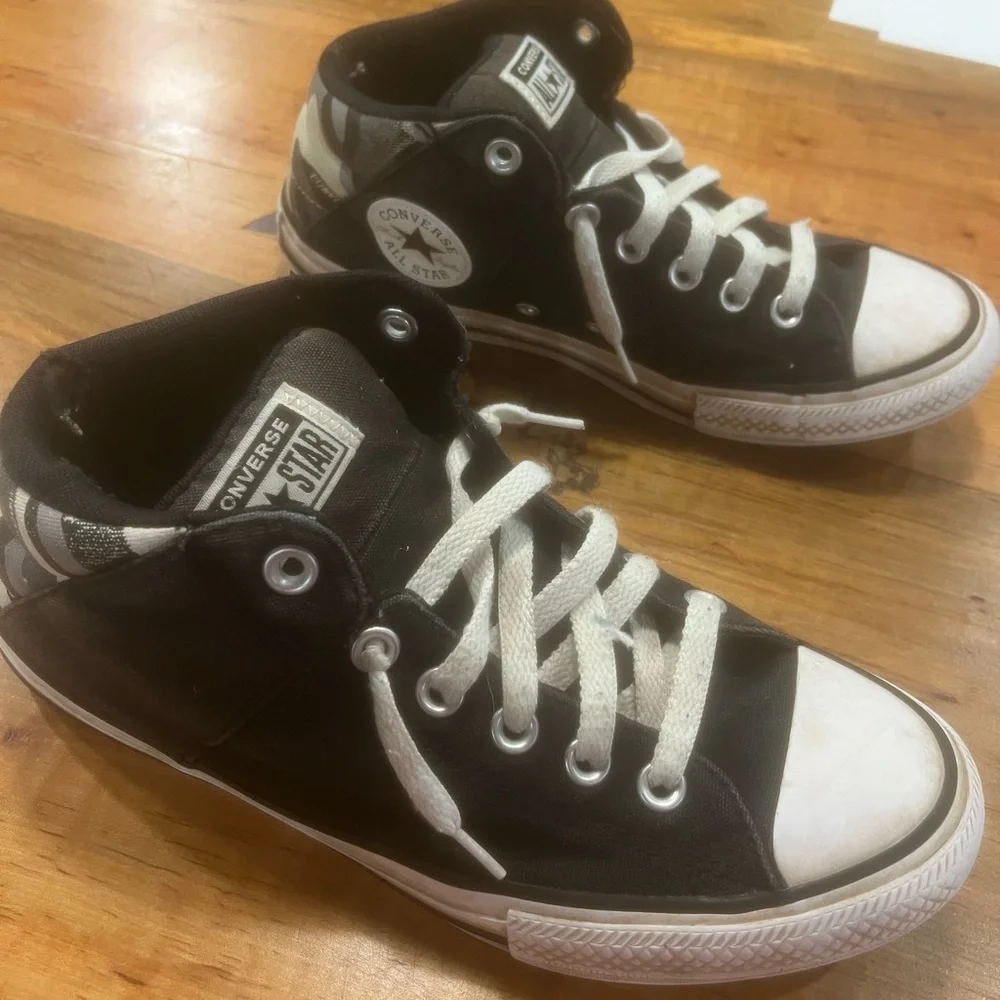 Converse Black and White High-Top Sneakers with Iconic Design